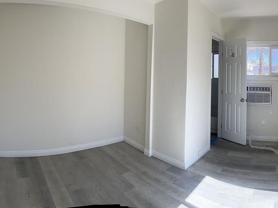 view of first bedroom with connection to bathroom