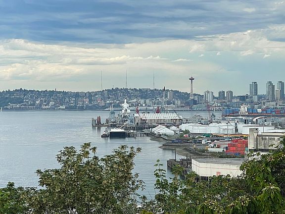 A telescope or binoculars provide hours of relaxing viewing of ferries, container and cruise ships, and maritime commerce.