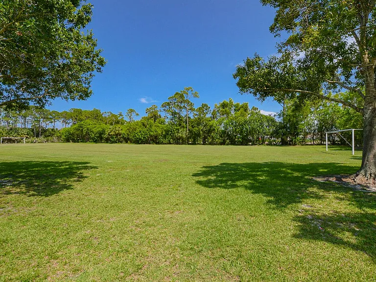 649 NE Bent Paddle Ln — Photo 45