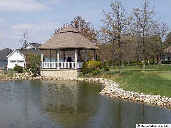 PRETTY GAZEBO OVERLOOKING A LAKE