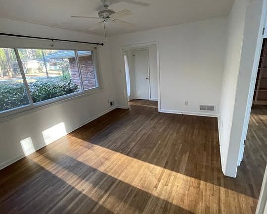 Front living room with large windows