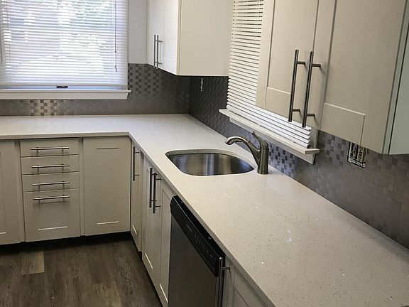 Brand New Dishwasher, Sink, Cabinets 

