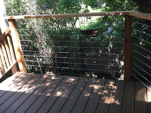entry deck surrounded by trees