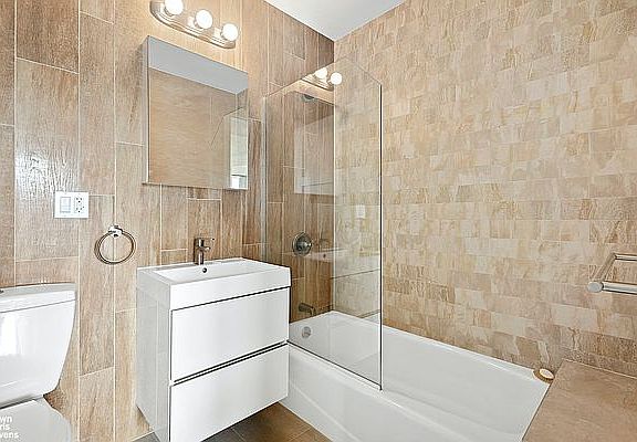 5th image of 399 E 8th St APT 6B