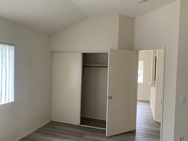 Spacious wardrobe in primary bedroom also has walk in closet and en suite bath