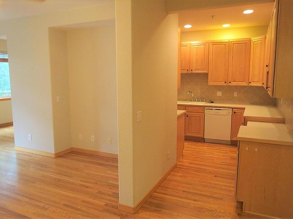 Peek into the kitchen from the family room. Lots of counter space and cabinets.