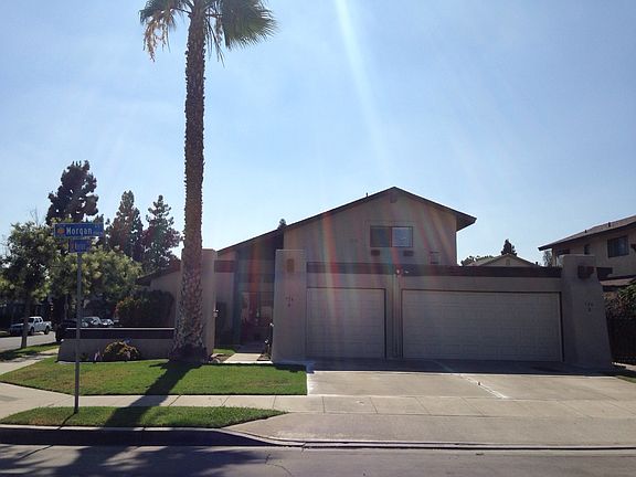 Exterior, Unit is side with 2-car garage