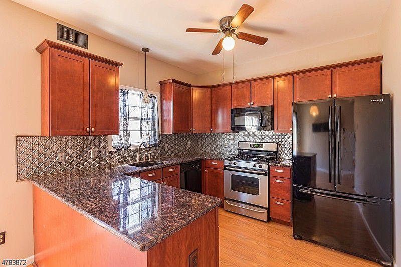 Modern Kitchen with Granite Countertop and New Appliances