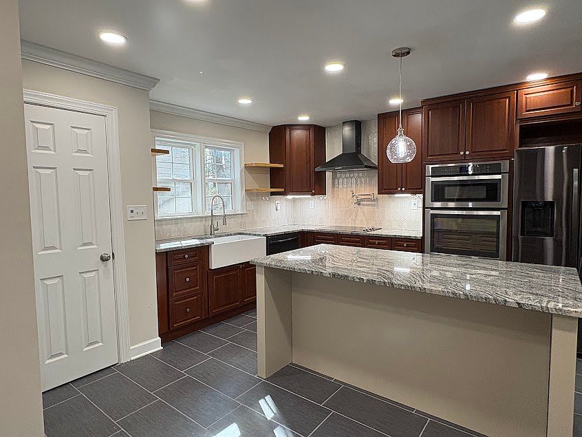 Beautiful, all-new gourmet kitchen with granite countertops and island.