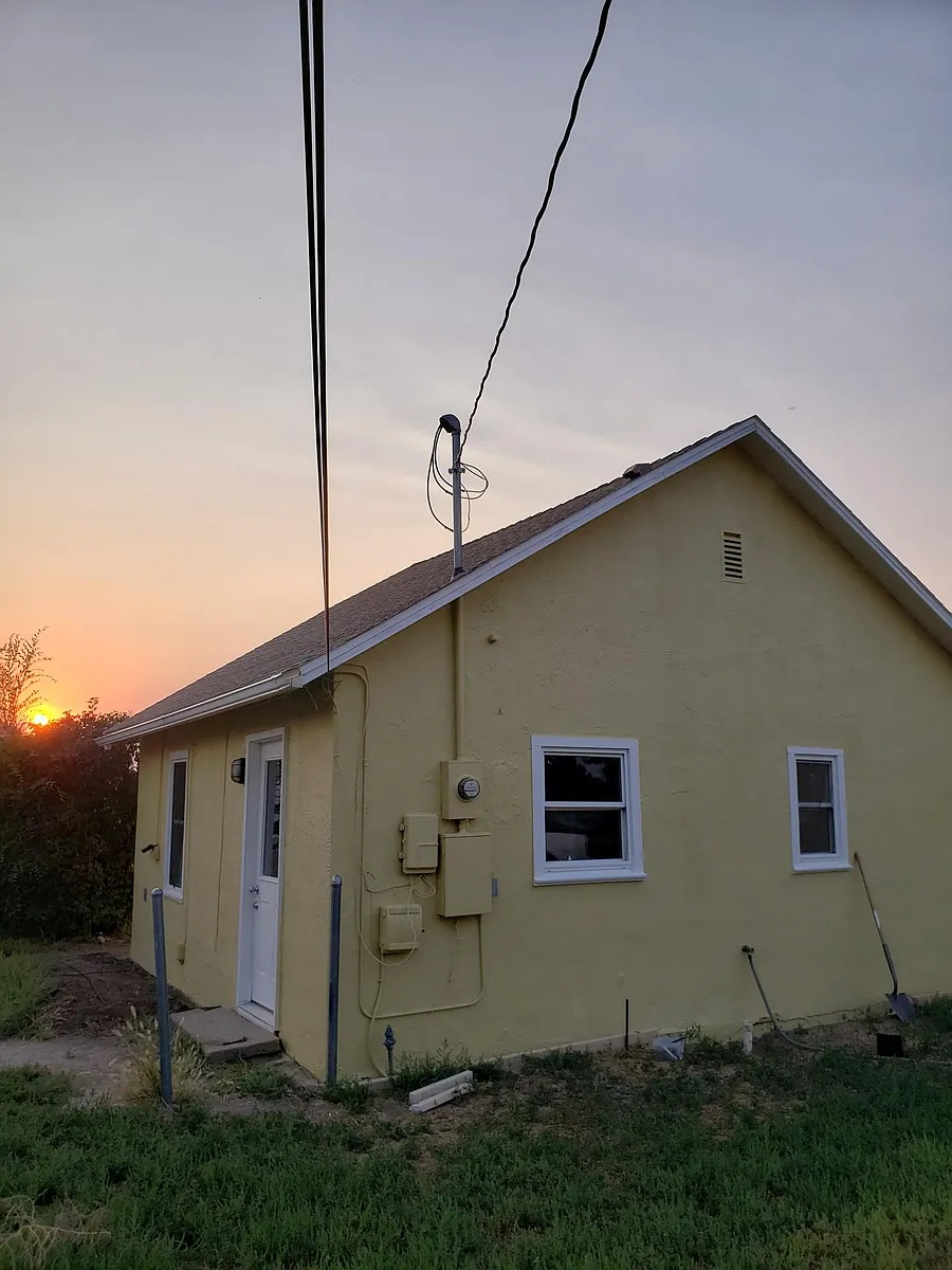 Side and back of house. - 330 N 8th Ave