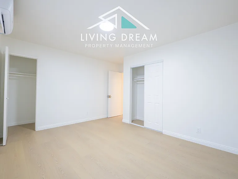 Bedroom 1:
Includes two closets and an air conditioning unit.