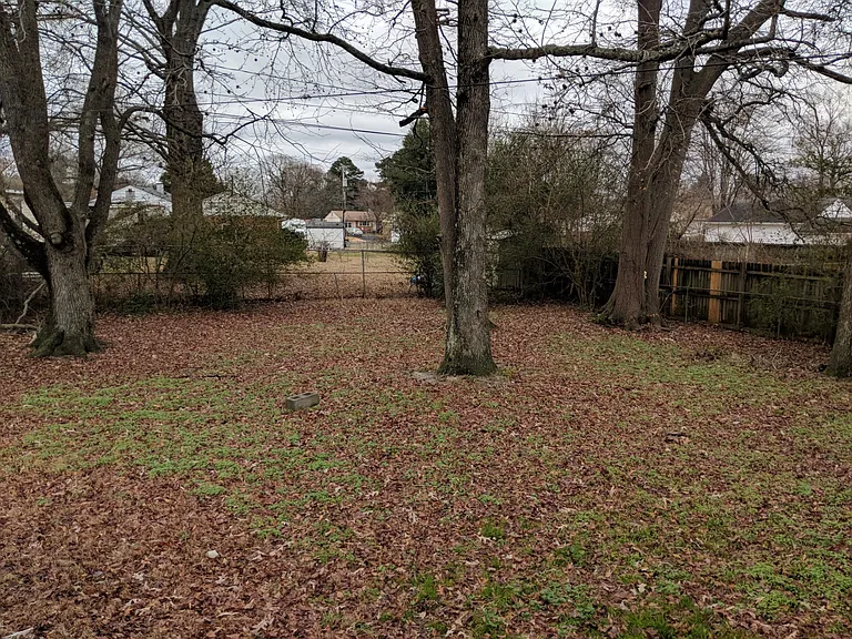 Fenced back yard, approximately 1/4 acre