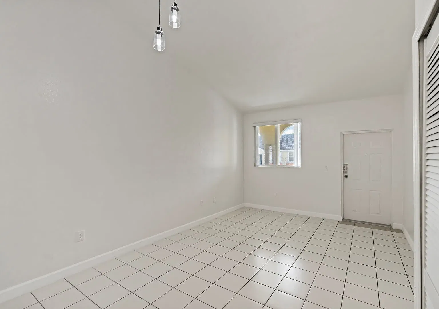 2-bath condo on the 2nd floor with a newly renovated kitchen featuring modern cabinets and granit... — Photo 4