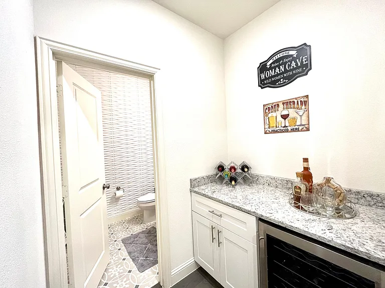 Butler's pantry and entry of half bath