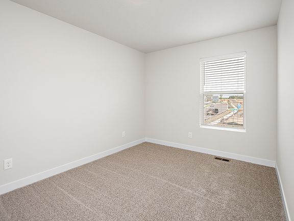 The secondary bedroom has carpet.