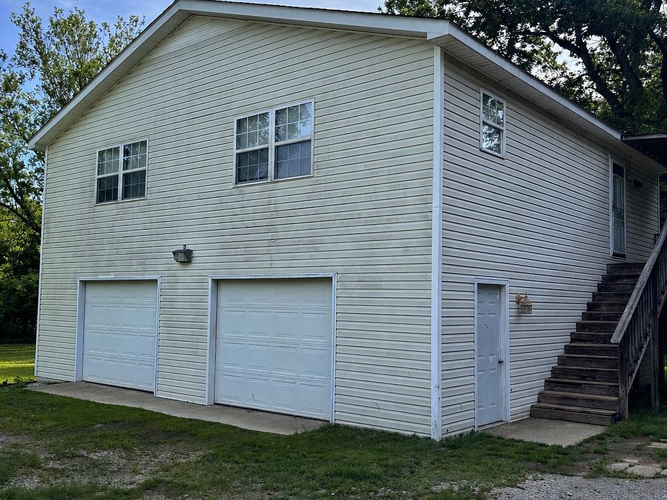 Exterior front, two garage parking spaces