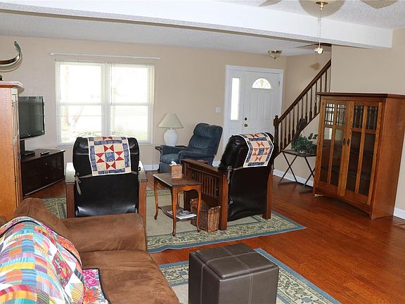 Open space living & dining rooms. Wonderful bay window in dining room overlooks the yard.