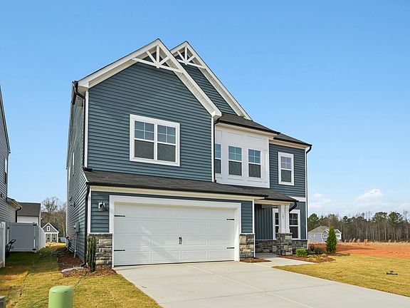 Exterior - Earthy textures and warm tones feel rooted in place.