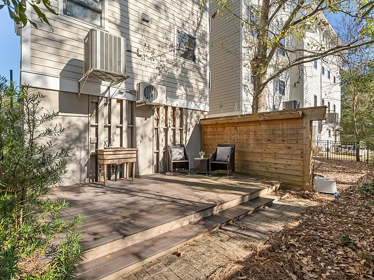Back deck area for grilling, outdoor sink.