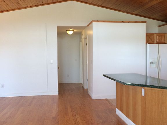 Living area: Open concept with kitchen, cathedral ceiling, w