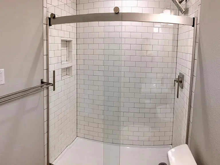 New walk-in shower with rain shower head