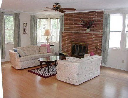 Large living room with fireplace.