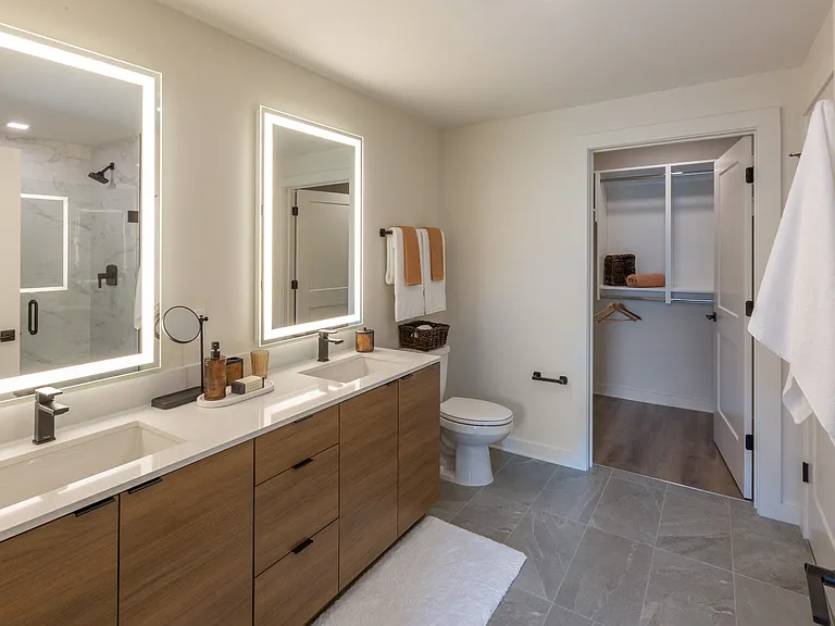 Backlit Vanity Mirror in All Bathrooms | A6 Wood Scheme | 1 Bedroom | 873 Sq. Ft.