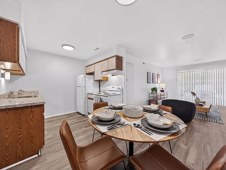 Open Concept Living-Dining at Lakeside Village Apartments in Clinton Township, MI
