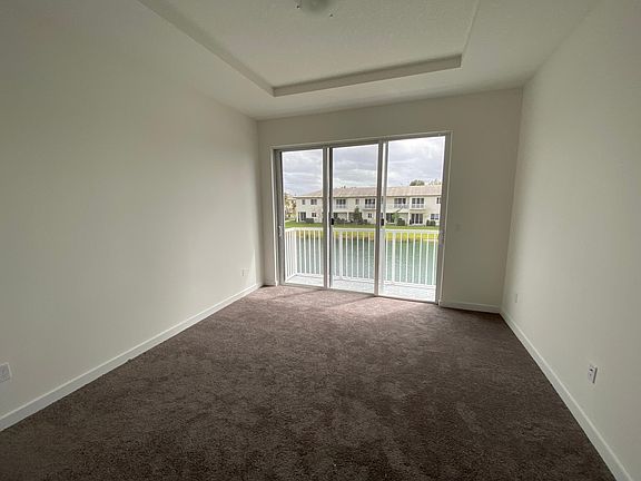 Master Bedroom w/ Balcony