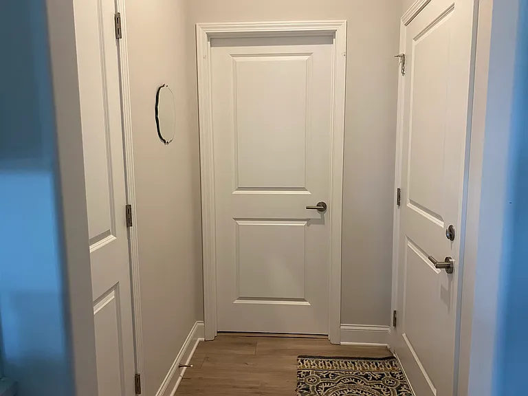 Garage entrance. Door to laundry and kitchen pantry.