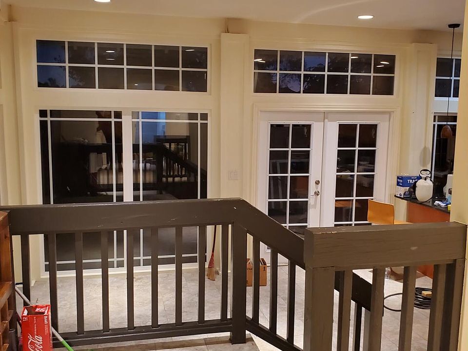 Overlooking the dining area and double door entry from TV/living room.