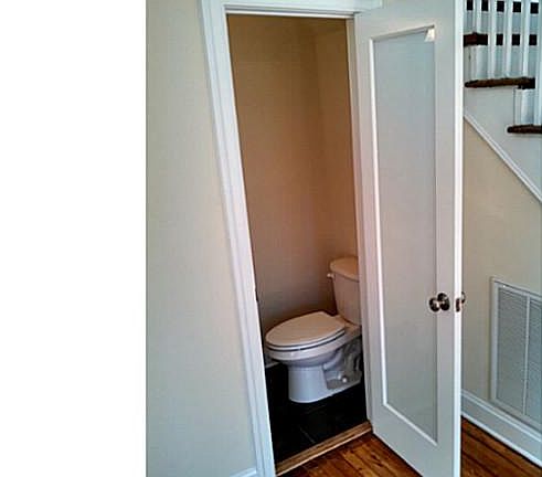 Half Bath on 1st floor with slate tile, pedestal sink and is all new