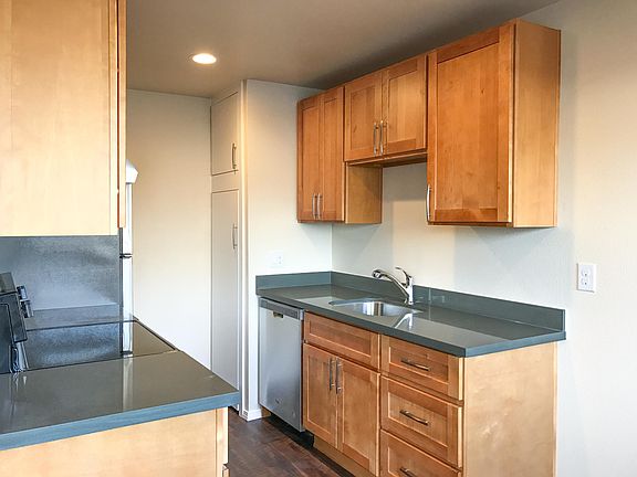 New Kitchen with Quartz countertops and Stainless appliances.