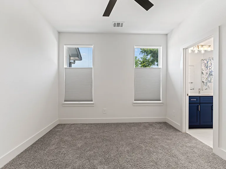 Bedroom 2 has a large closet and direct access to the Jack 'n Jill bathroom. Room dimension is 12'6" x 11'