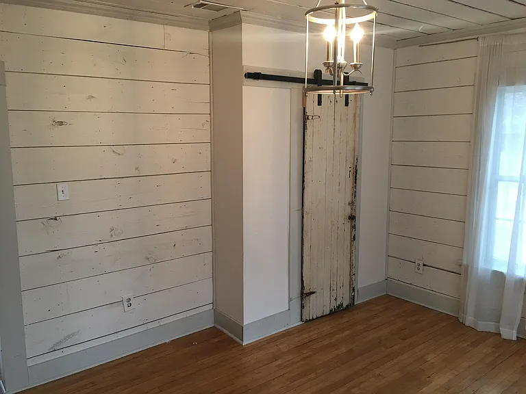 Master bedroom with one of the closets