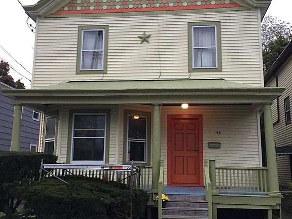 During exterior painting. Steps' risers have been painted. Scaffolding has been removed.