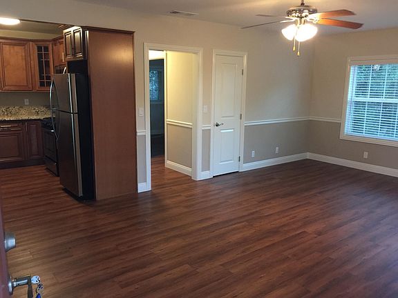 Living room and kitchen as seen from the front door.