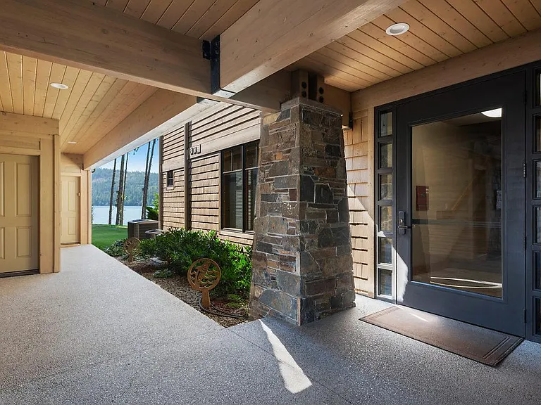 Entry to secure building. One car, over-sized garage with storage, door on left.