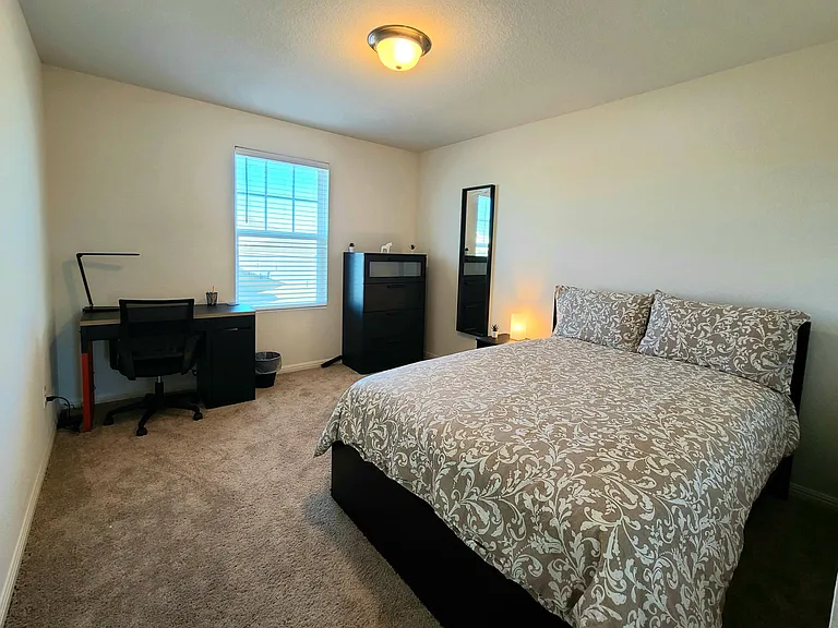 Bedroom #2 located in the second floor. Furniture includes a full size (double bed), night table and lamp, 4-drawer dresser, full size mirror and a work area (desk, lamp, USB-power strip and chair)