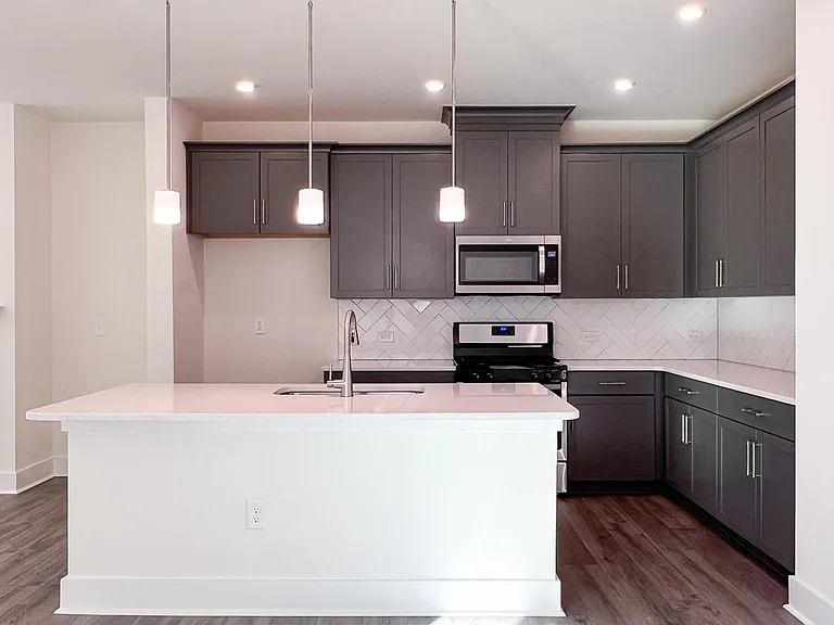 Kitchen - Quartz Counter Tops and Premium Appliances
