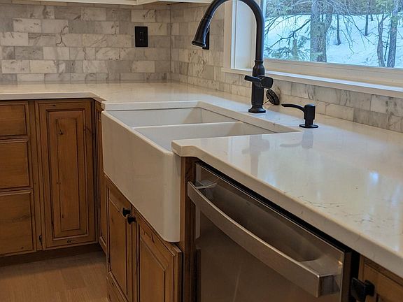 New farmhouse sink with private views out back.