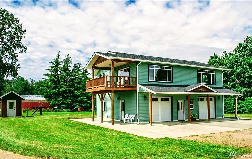 Country home on shy 15 acres in great location, with cute pumphouse, creek, wired for generator and 220 in spacious garage.
