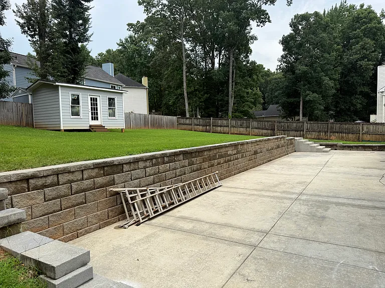 Beautiful spacious backyard w/access to a storage room.