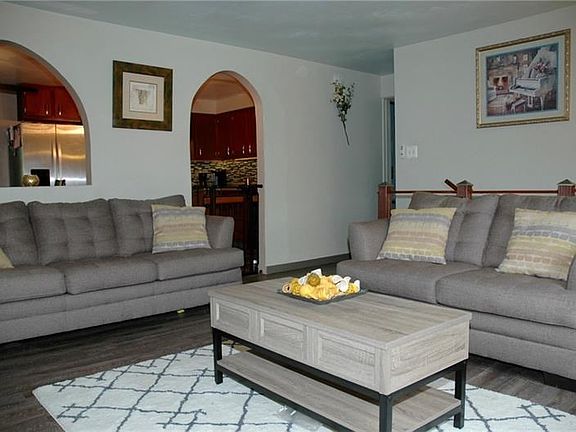 Archways draw your eye to this updated kitchen
