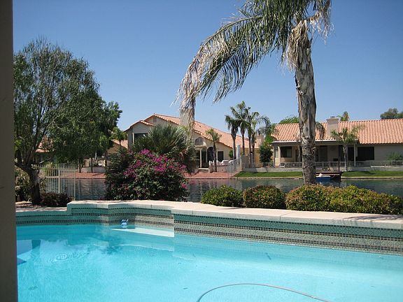 Pool overlooks beautiful lake