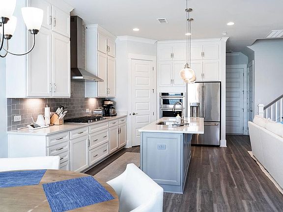 Custom ceiling height cabinets for optimal storage