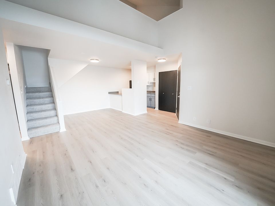 View of Living Room & Stairs