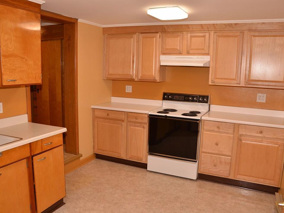 Part of Kitchen Cupboards, Stove from Entry Door