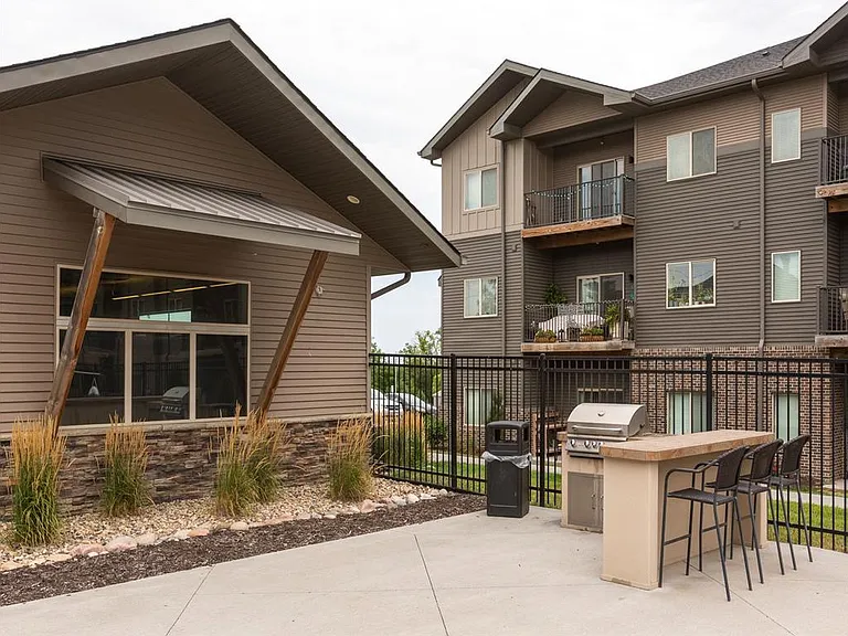 Community grilling area by clubhouse at Avenue 204.