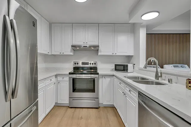 updated immaculate kitchen with stainless steel appliances